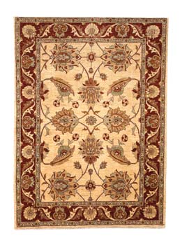 This Chobi natural-dye rug was knotted by an artisan in a village near Peshawar, in the border region of Pakistan and Afghanistan. (4’11” x 6’10”: $2,295)